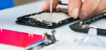 human-hand-repairing-cellphone-80875622